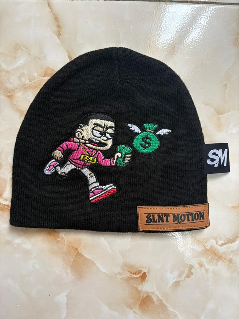 SLNT MOTION beanie flat lay on a marble surface