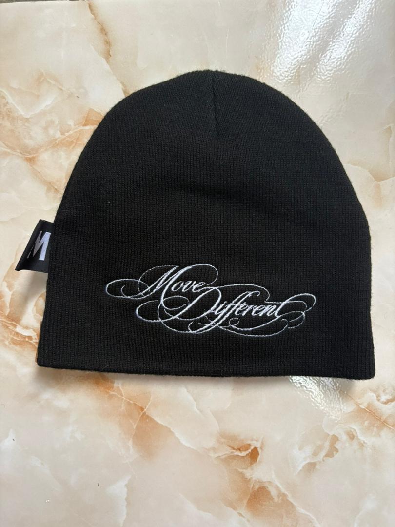 Back of the SLNT MOTION beanie, embroidered Move Different script