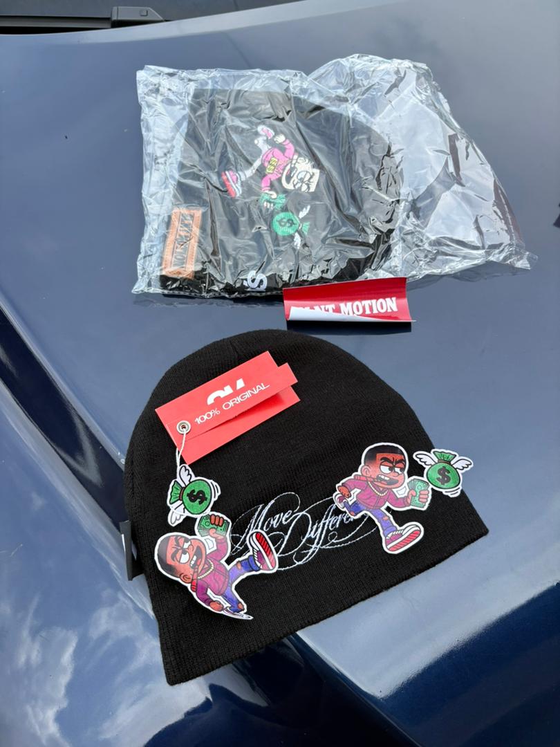 SLNT MOTION beanie wrapped and a second beanie with hang tags on display